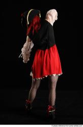 DARINA STANDING POSE WITH SHOTGUN